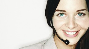 Smilling woman with headset, Portrait.
